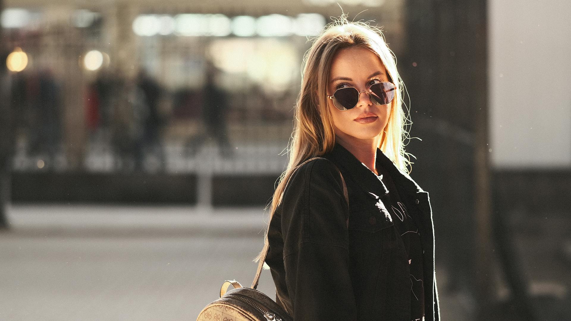Woman in a jacket on a city street